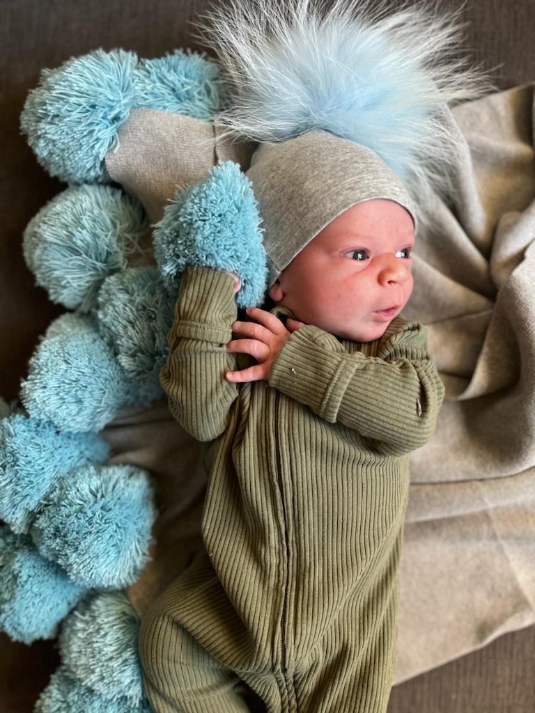 Blue pom pom blanket