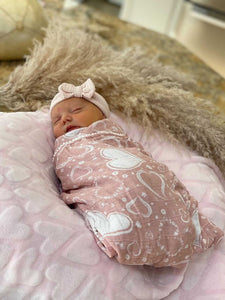 Pom trim heart swaddle