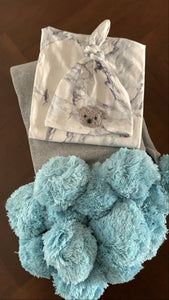 Blue pom pom blanket