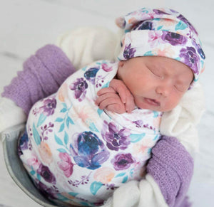 Bright floral swaddle + headband + knot hat