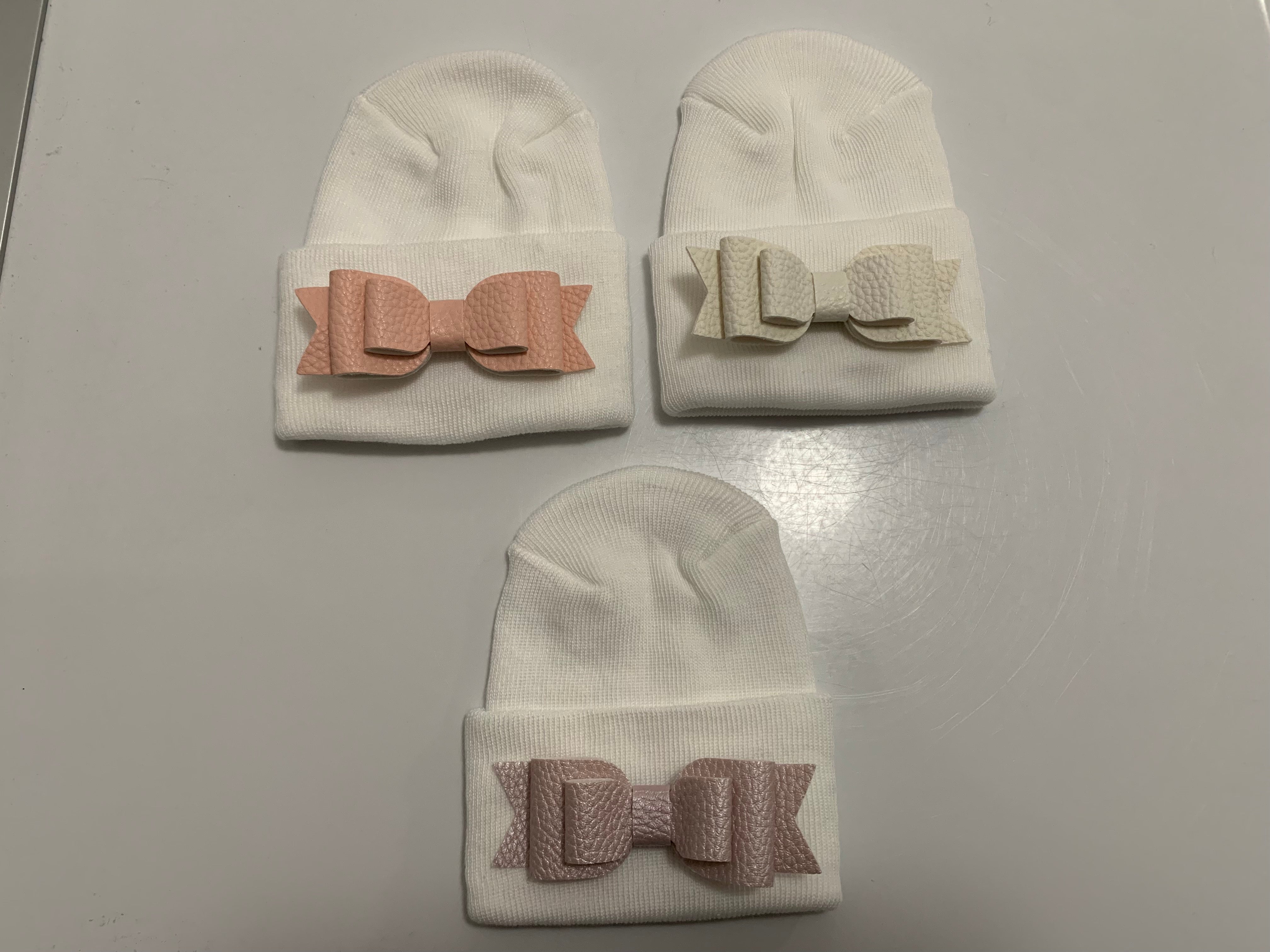 Peach pink, ivory, and shiny violet hospital hats